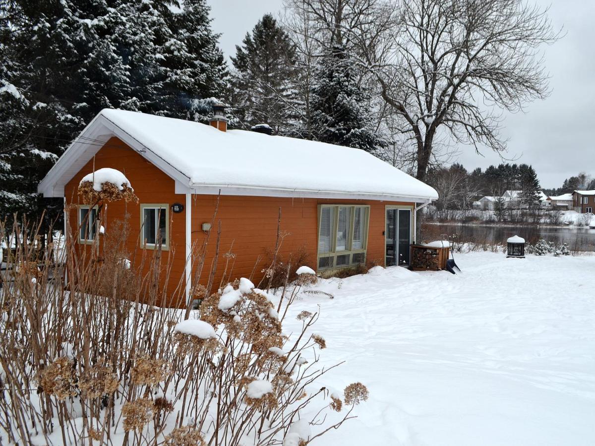 Les 4 Chalets - Le 605 Lac-Saint-Paul Exteriör bild